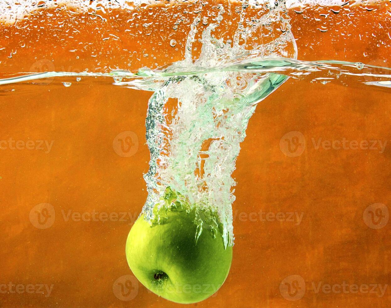 Green apples in water photo