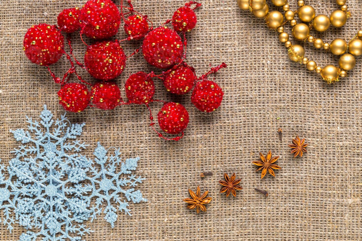 Christmas toy on natural sackcloth background photo