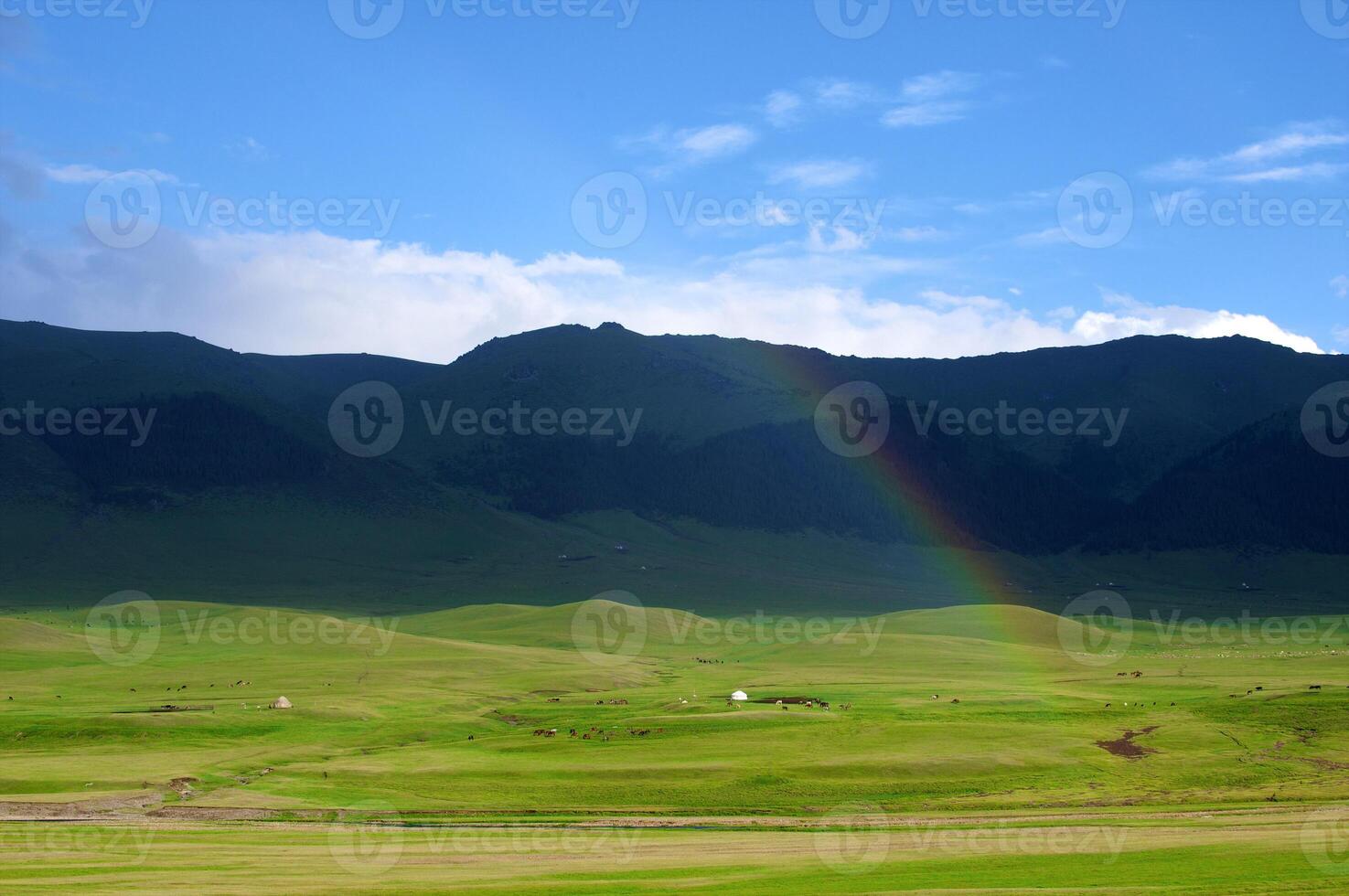 Rainbow after the storm in the mountains of Almaty region national park Assy photo
