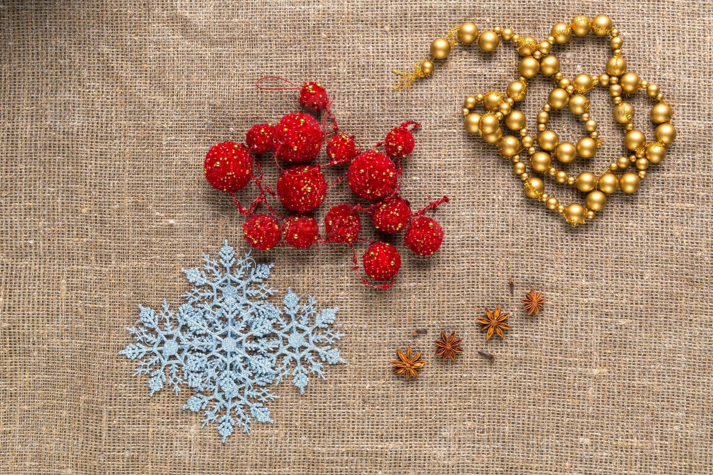 Christmas toy on natural sackcloth background photo