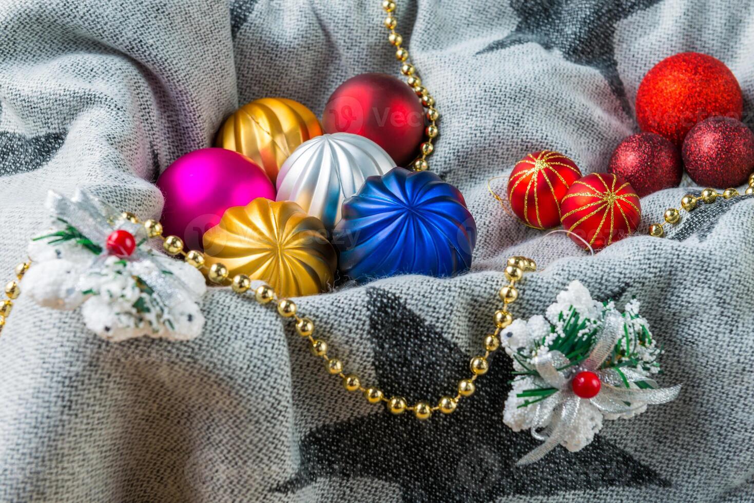 Christmas decorations on a color background. New year toys. photo