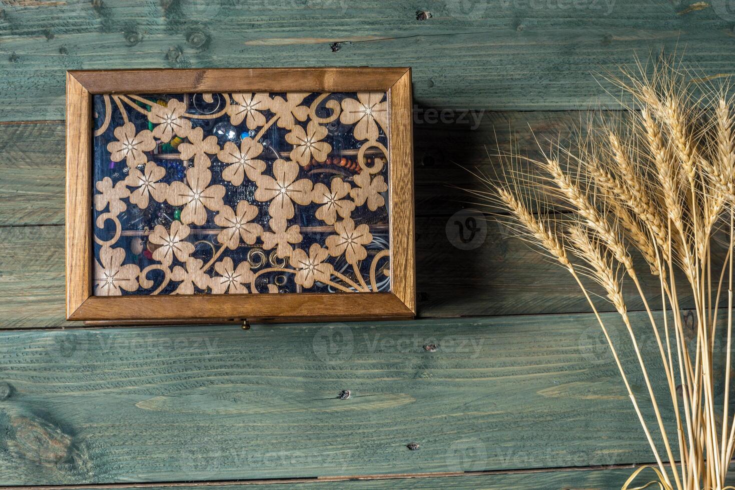 necklace and beads on a wooden background photo
