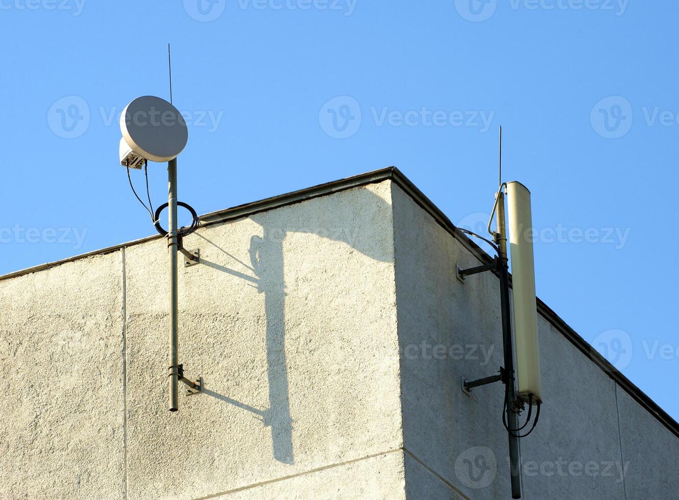 detailed communication antenna on a blue sky photo
