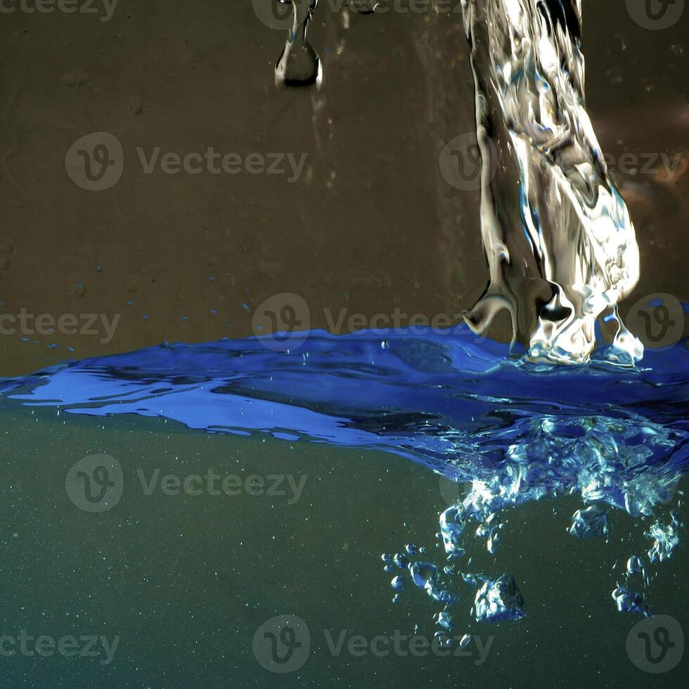 Fresh water with waves and bubbles photo