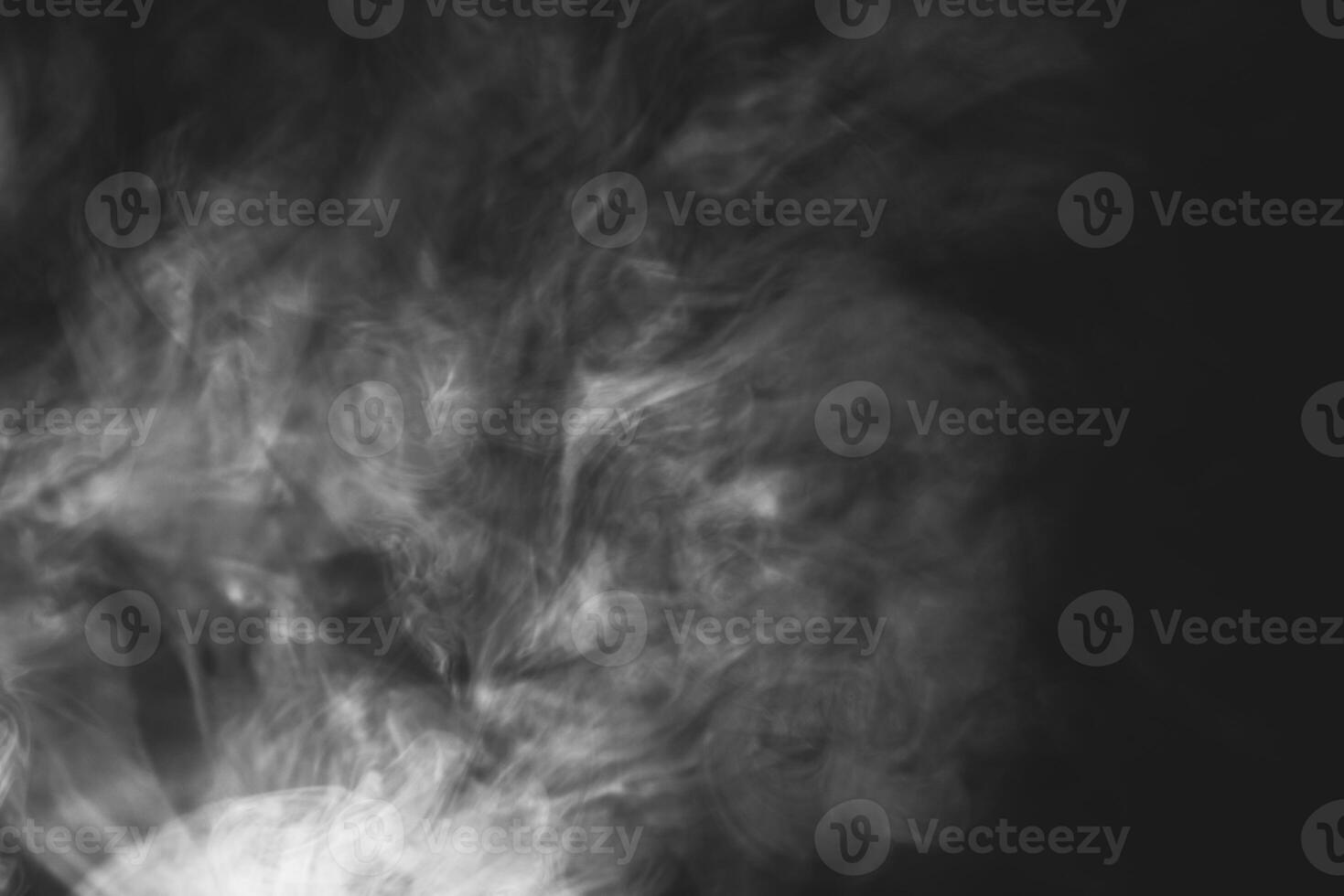 White smoke isolated on black background photo