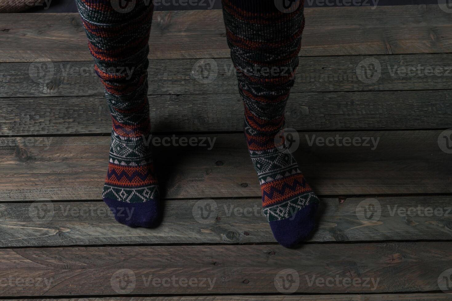 Color socks on a wooden floor photo