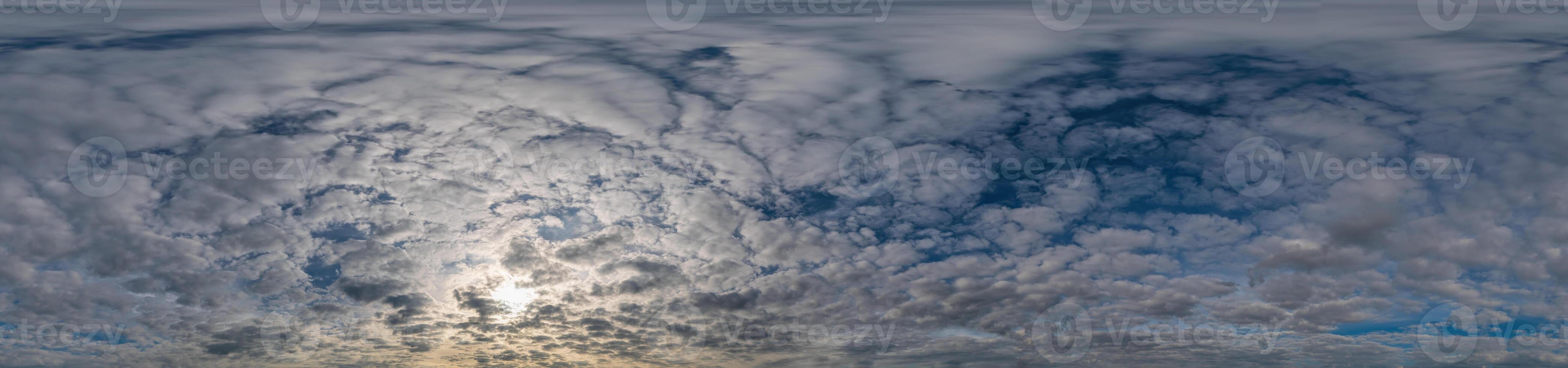 Sky panorama with Stratocumulus clouds in Seamless spherical equirectangular format. Full zenith for use in 3D graphics, game and editing aerial drone 360 degree panoramas for sky replacement. photo