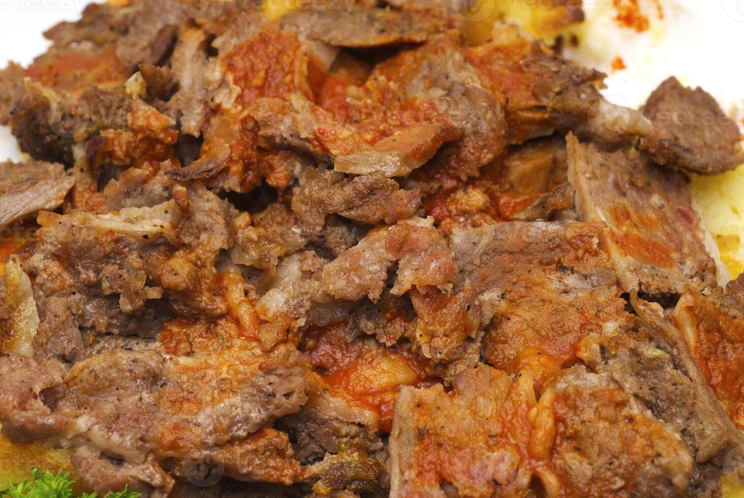 Fried meat with the vegetables and the verdure photo