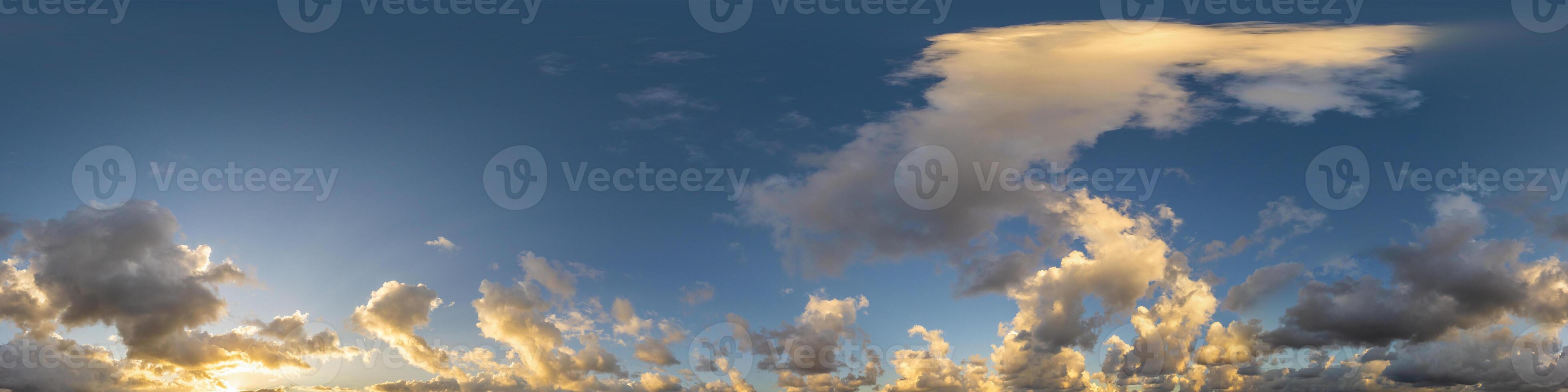 Dark blue sunset sky panorama with Cumulus clouds. Seamless hdr pano in spherical equirectangular format. Complete zenith for 3D visualization, game and sky replacement for aerial drone 360 panoramas. photo