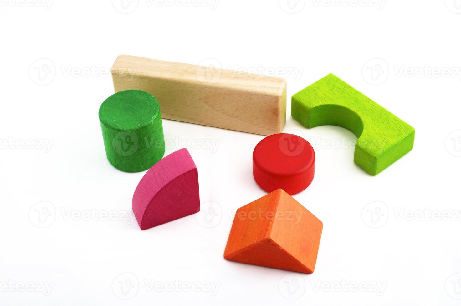 Wooden toy blocks on white background photo