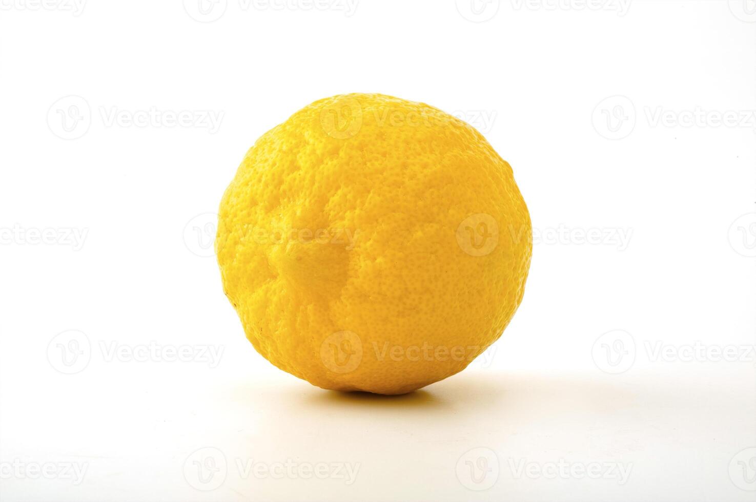 Ripe Lemon on the white background photo
