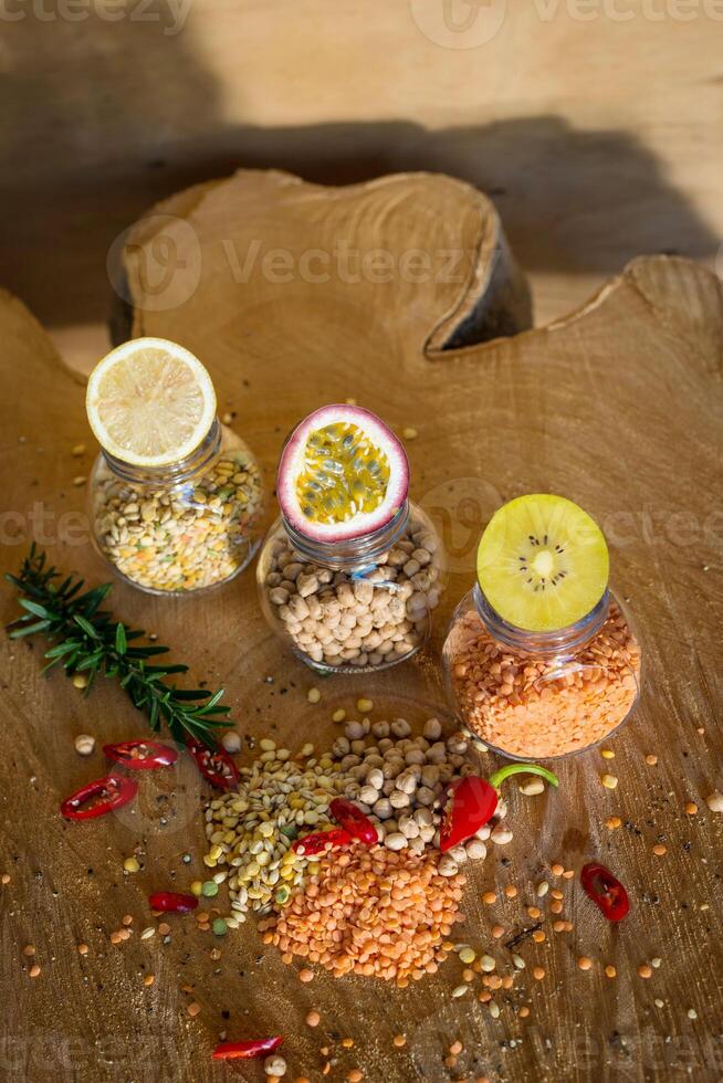 Raw cereals set on wooden background photo