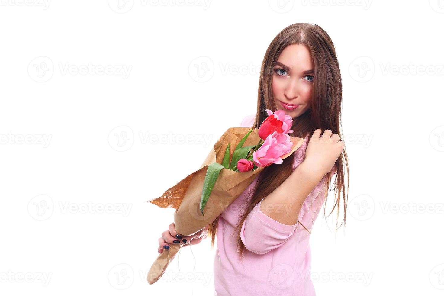 Woman with Spring Flower bouquet. Happy surprised model woman smelling flowers. Mother's Day. Springtime. 8 march. Isolated on white. photo