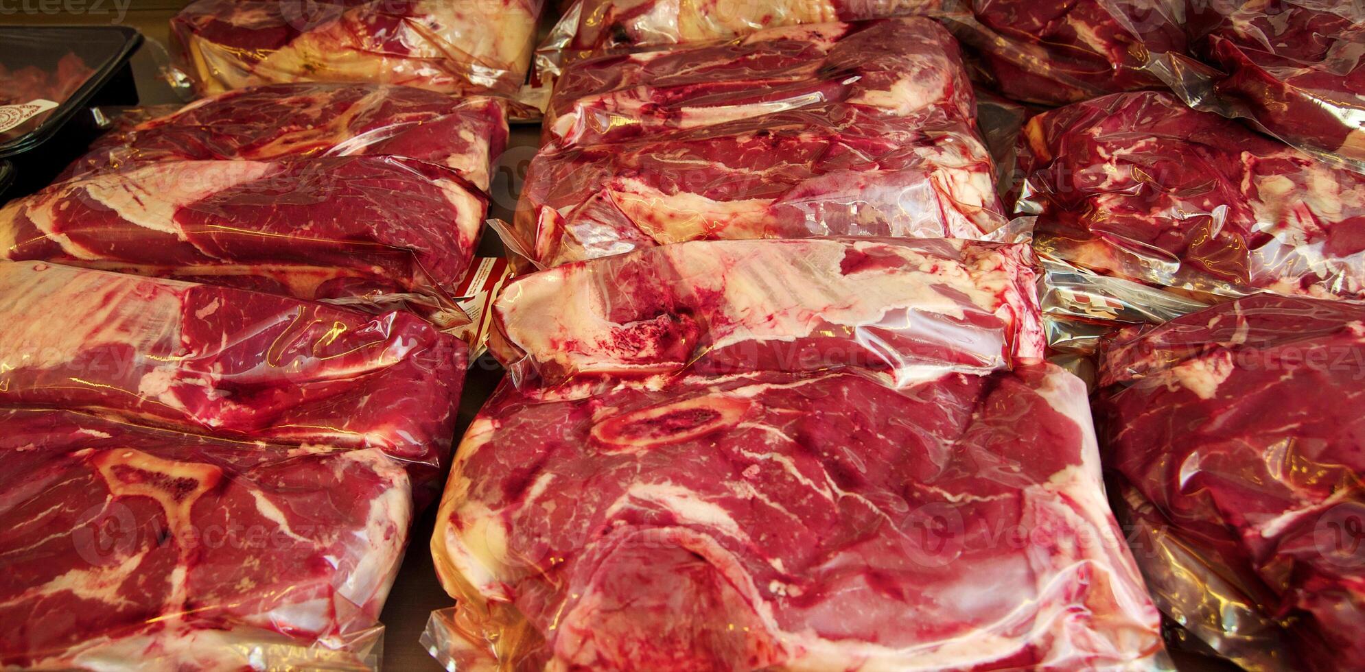 Fresh meat section in supermarket photo