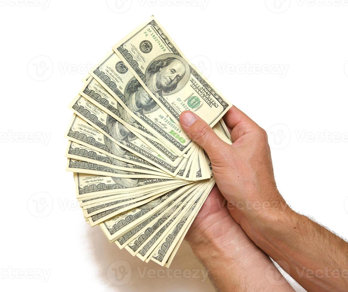 American dollars arranged in stacks of 100 bills each photo
