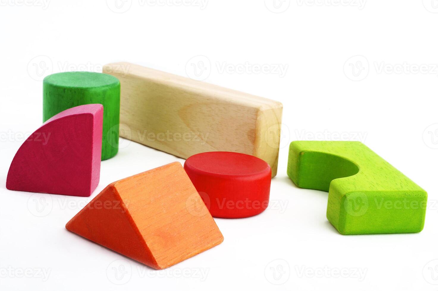 Wooden toy blocks on white background photo