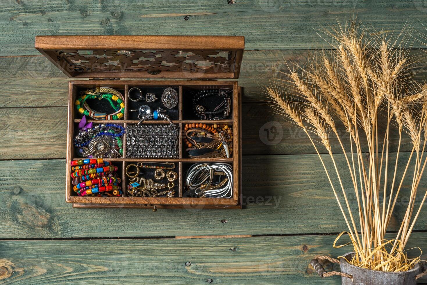 necklace and beads on a wooden background photo