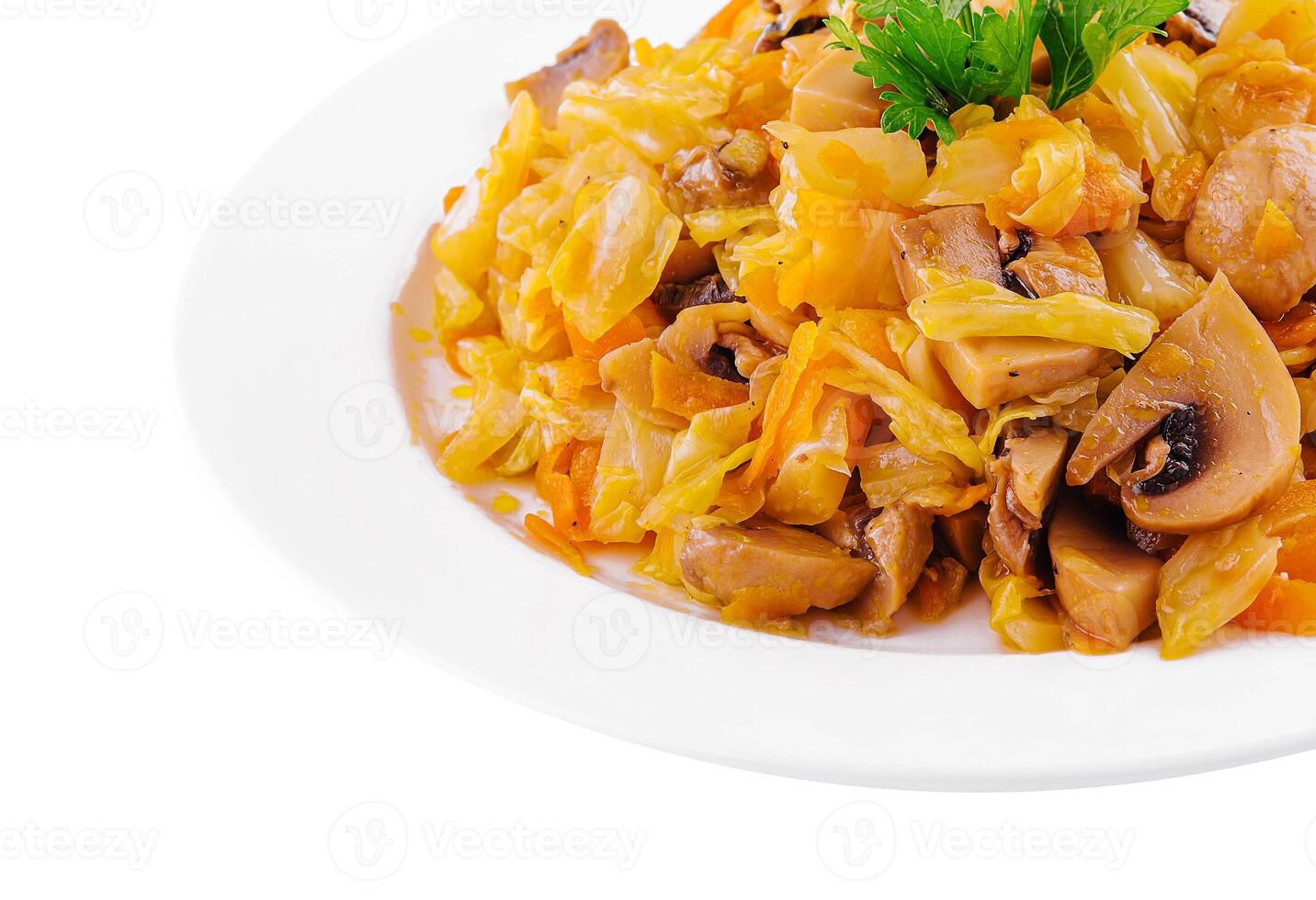 Fried cabbage with mushrooms on white plate photo