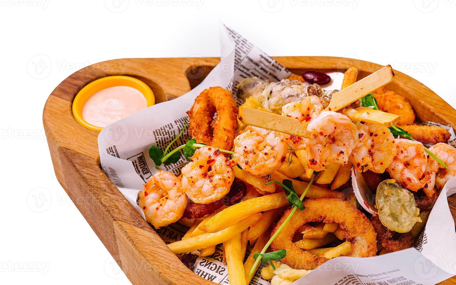 fried seafood plate on wooden tray photo