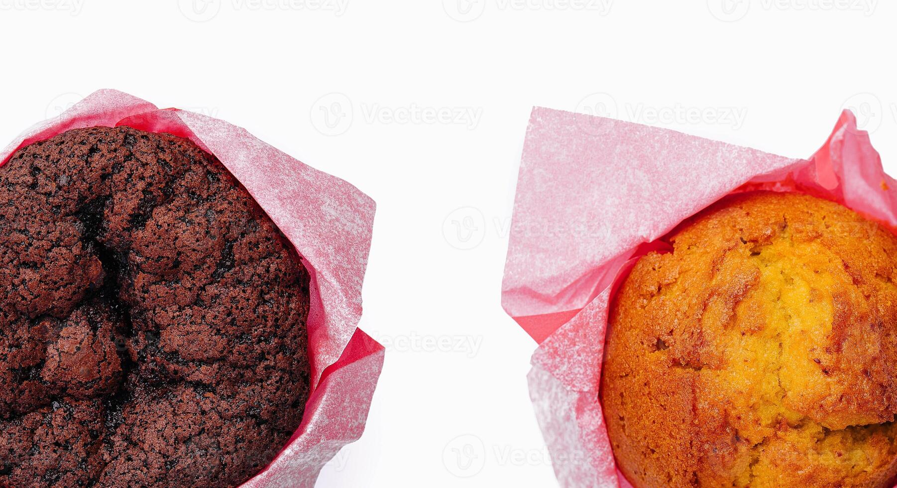 Delicious chocolate brownie and vanilla cupcake on top view isolated photo