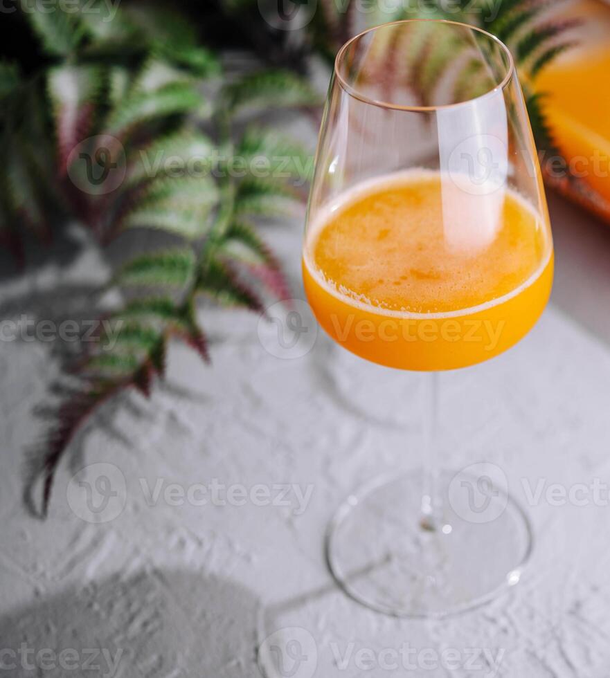 Orange Juice in glass top view photo