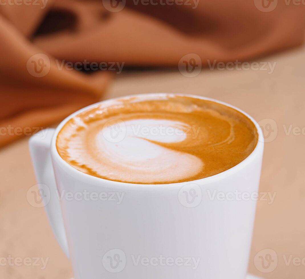Cup of cappuccino on top view photo