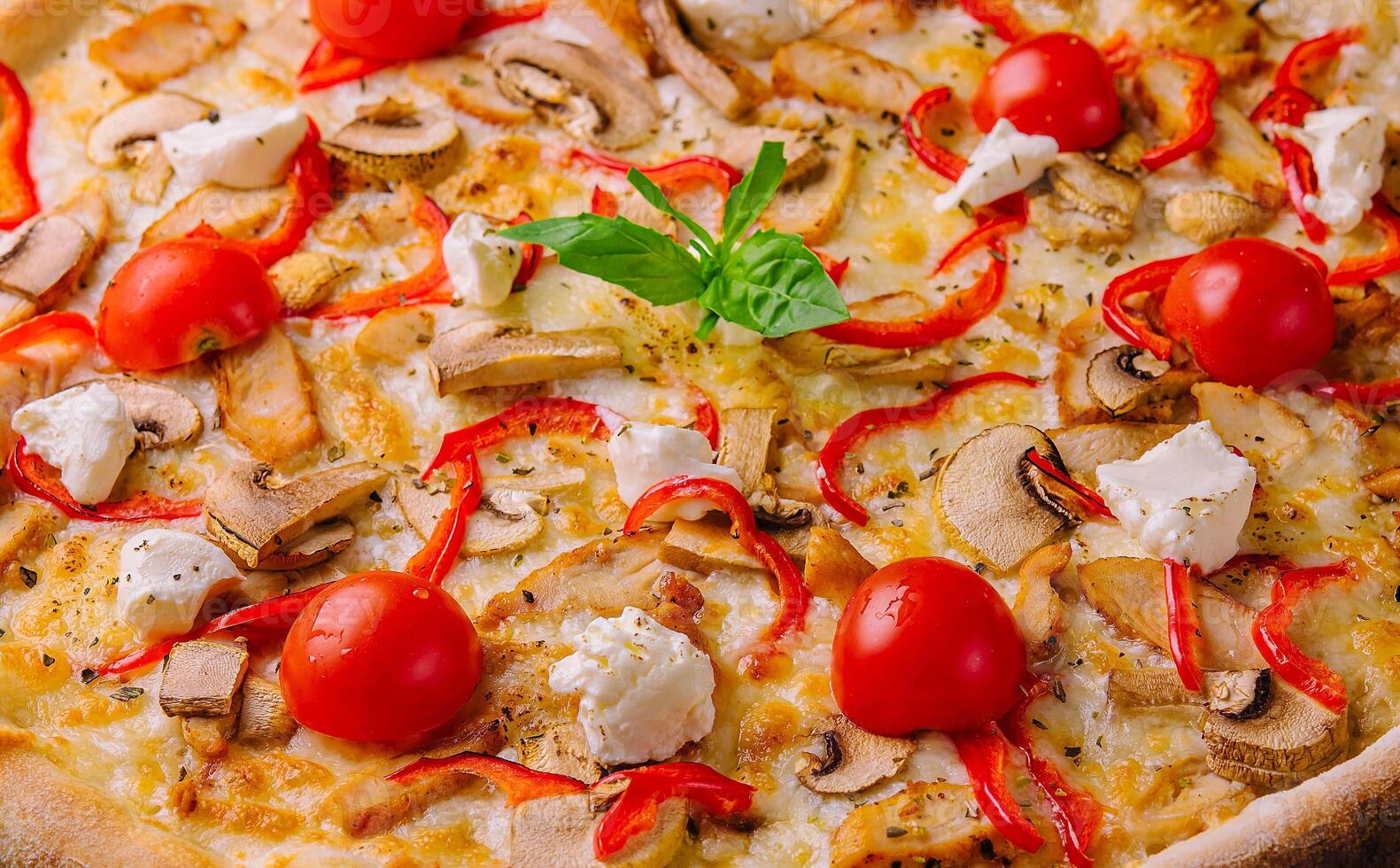 Pizza with chicken and tomatoes photo