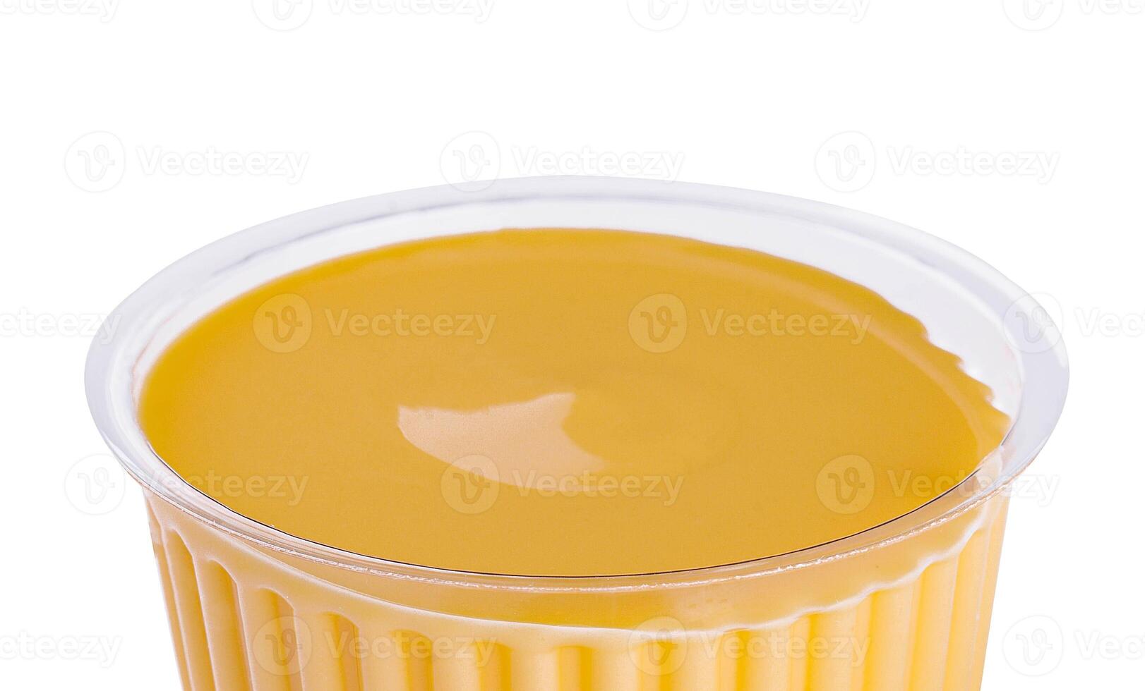 Mustard sauce in plastic bowl isolated on white background photo