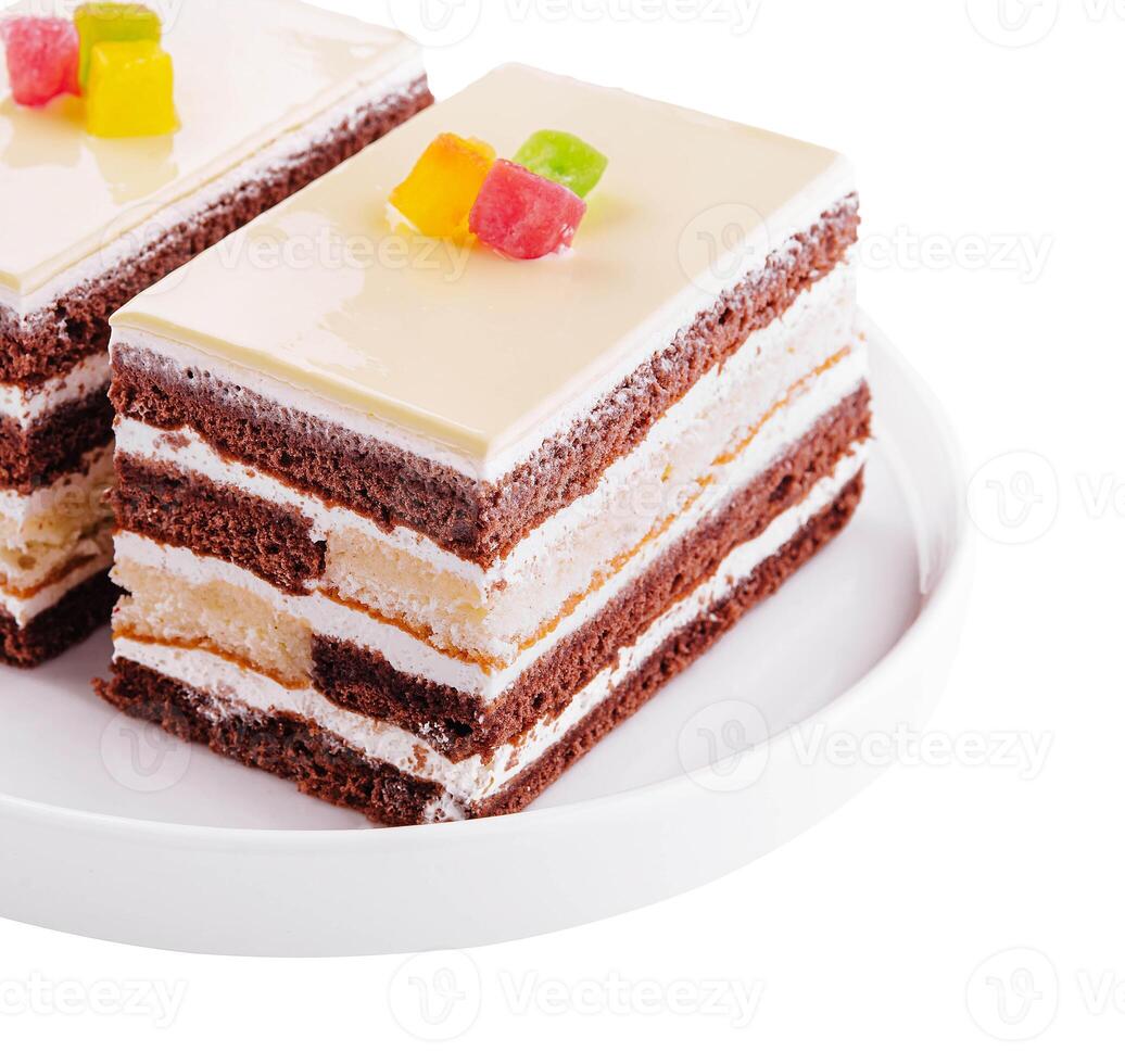 Delicious multilayer cocoa sponge cake with sugar mass photo