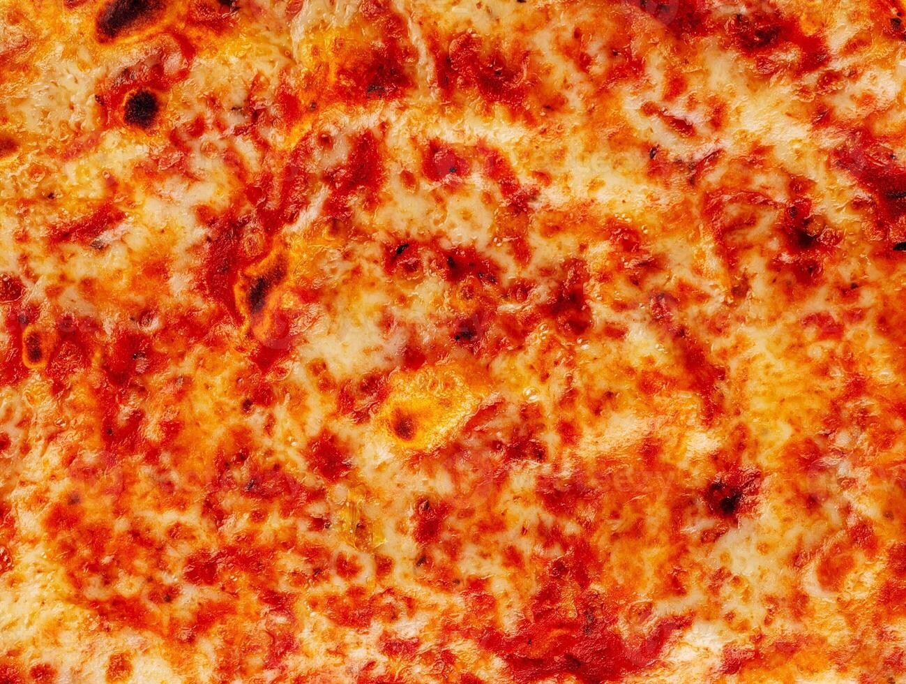Pizza margarita top view close up photo
