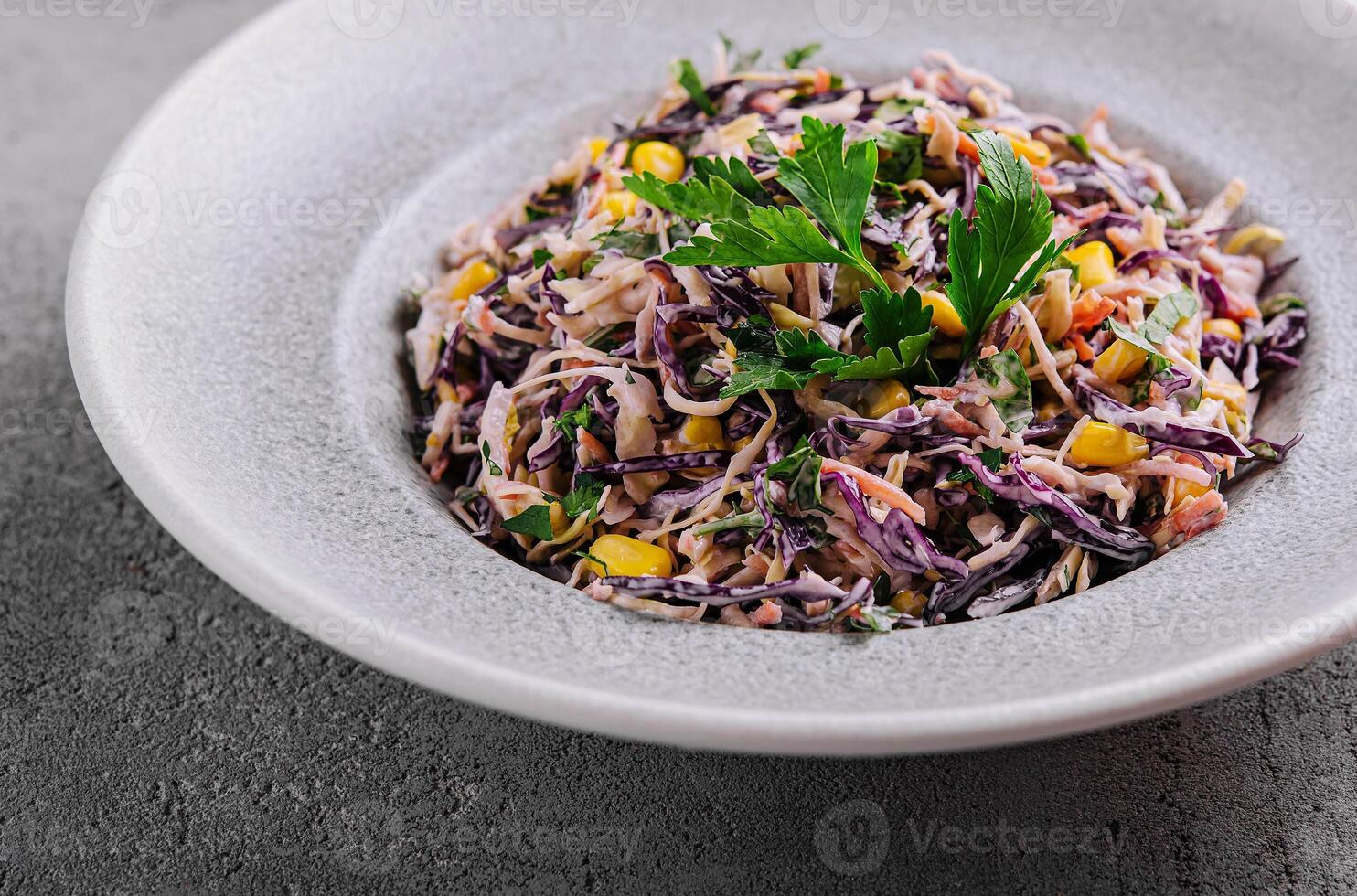 Fresh red cabbage salad with corn photo