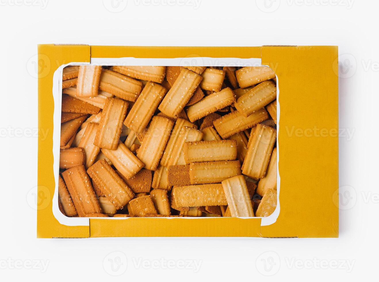 Box of salted breadsticks isolated on white photo