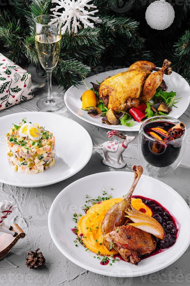 Festive christmas dinner spread with roasted duck photo