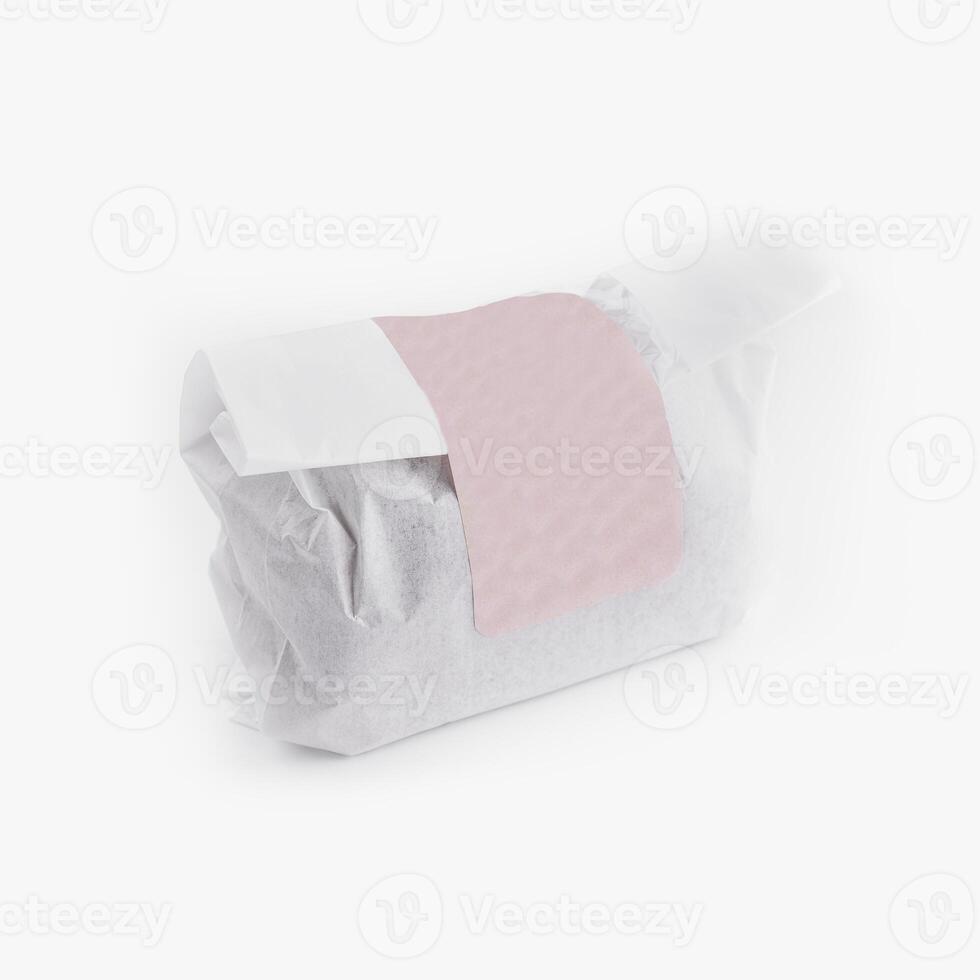 Wrapped product on white background photo