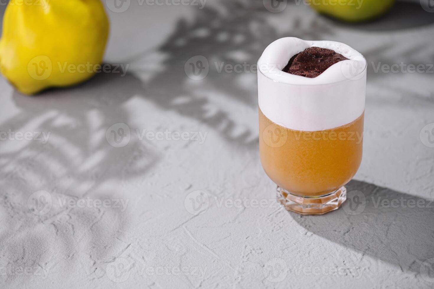 Refreshing whipped cocktail with citrus shadow photo