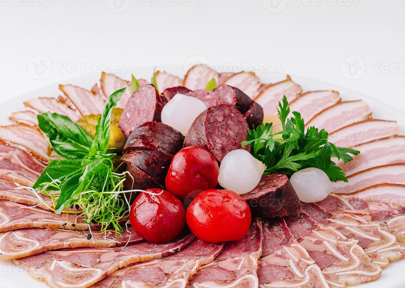 Assorted deli meat platter on white background photo