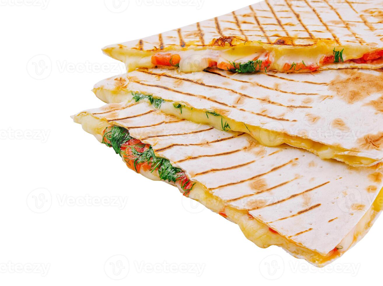 Fresh chicken and vegetable quesadilla slices isolated on white photo