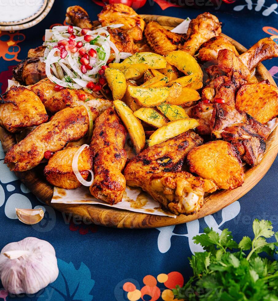 Succulent grilled chicken and potato feast photo