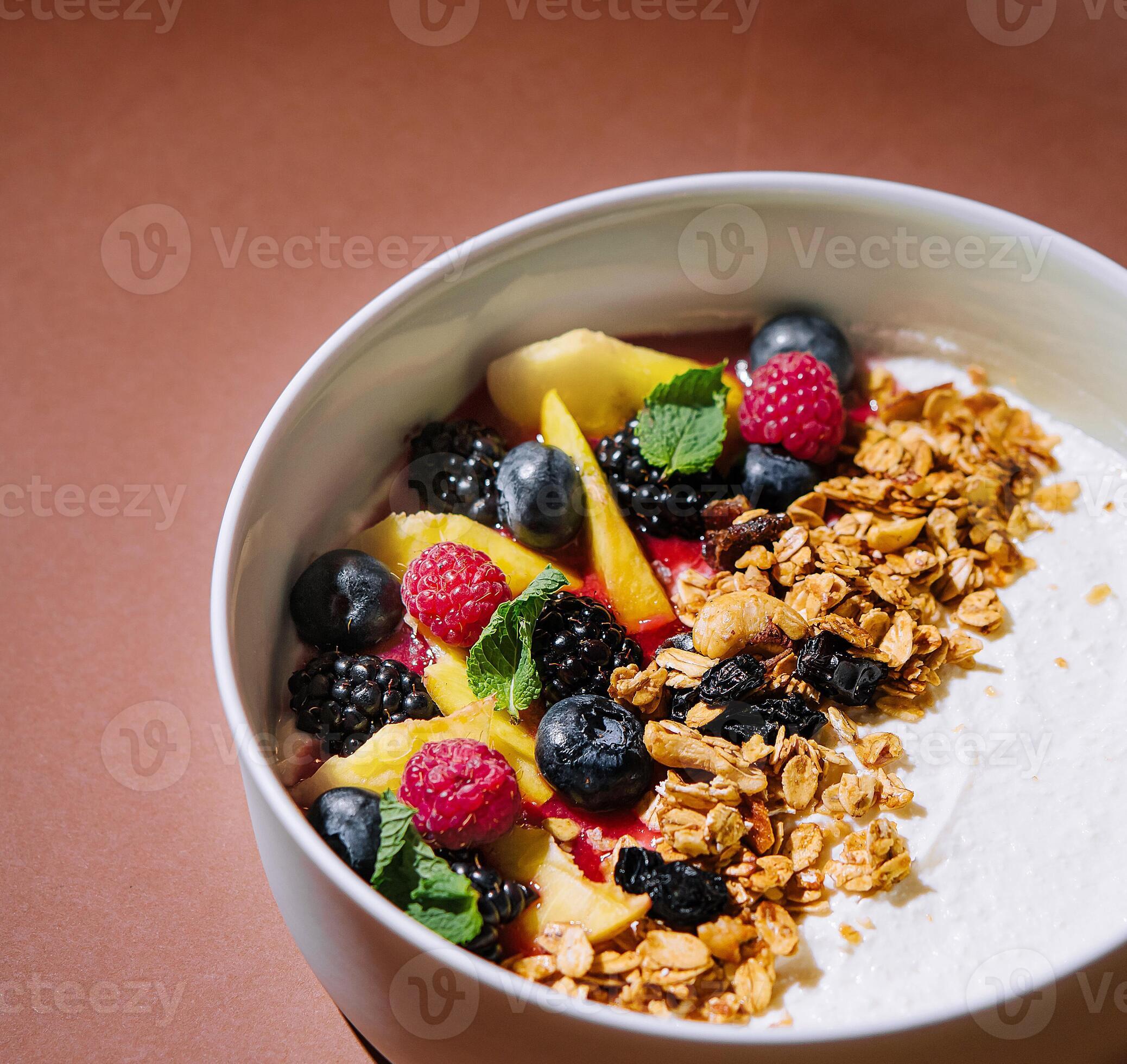 Fresh fruit yogurt bowl on elegant brown background 45606946 Stock