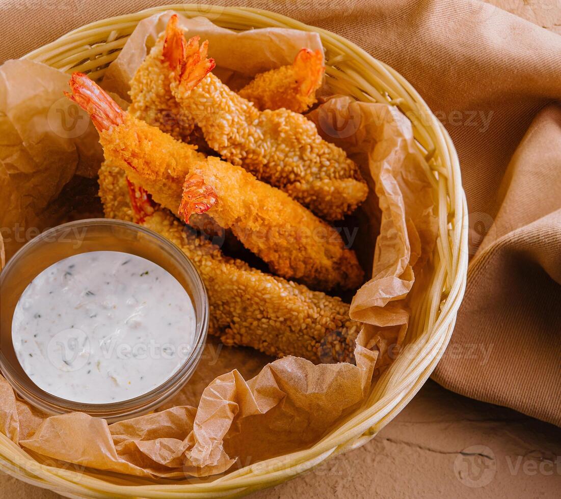Crunchy breaded shrimp with dipping sauce photo
