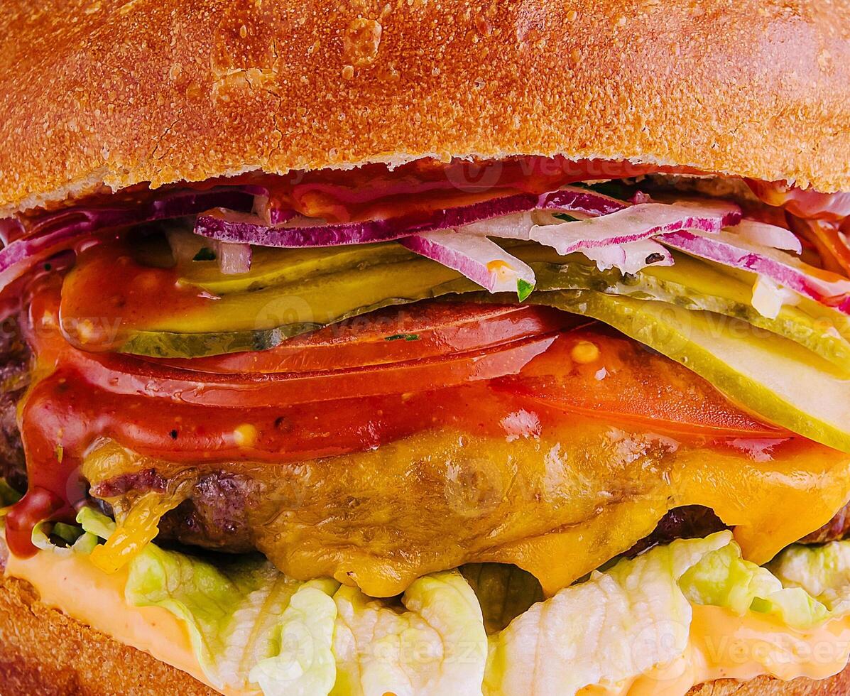 Delectable gourmet cheeseburger close up photo