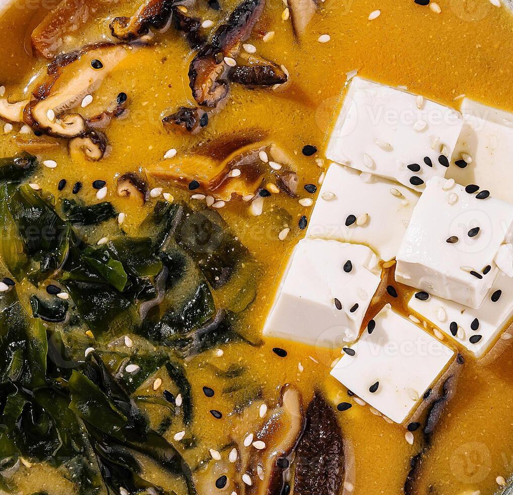 Homemade miso soup with tofu and seaweed photo