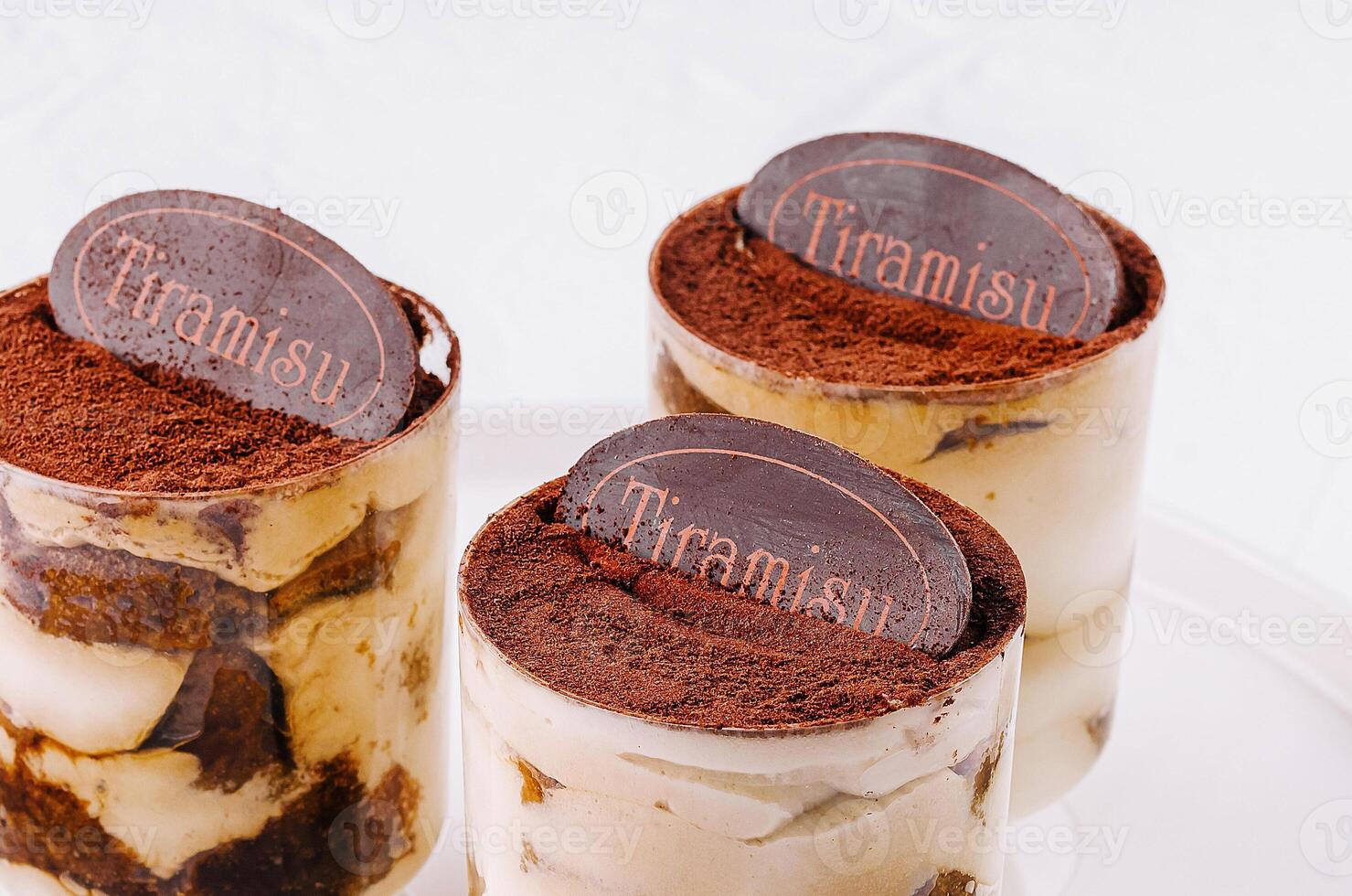 Tiramisu dessert trio in glass cups photo