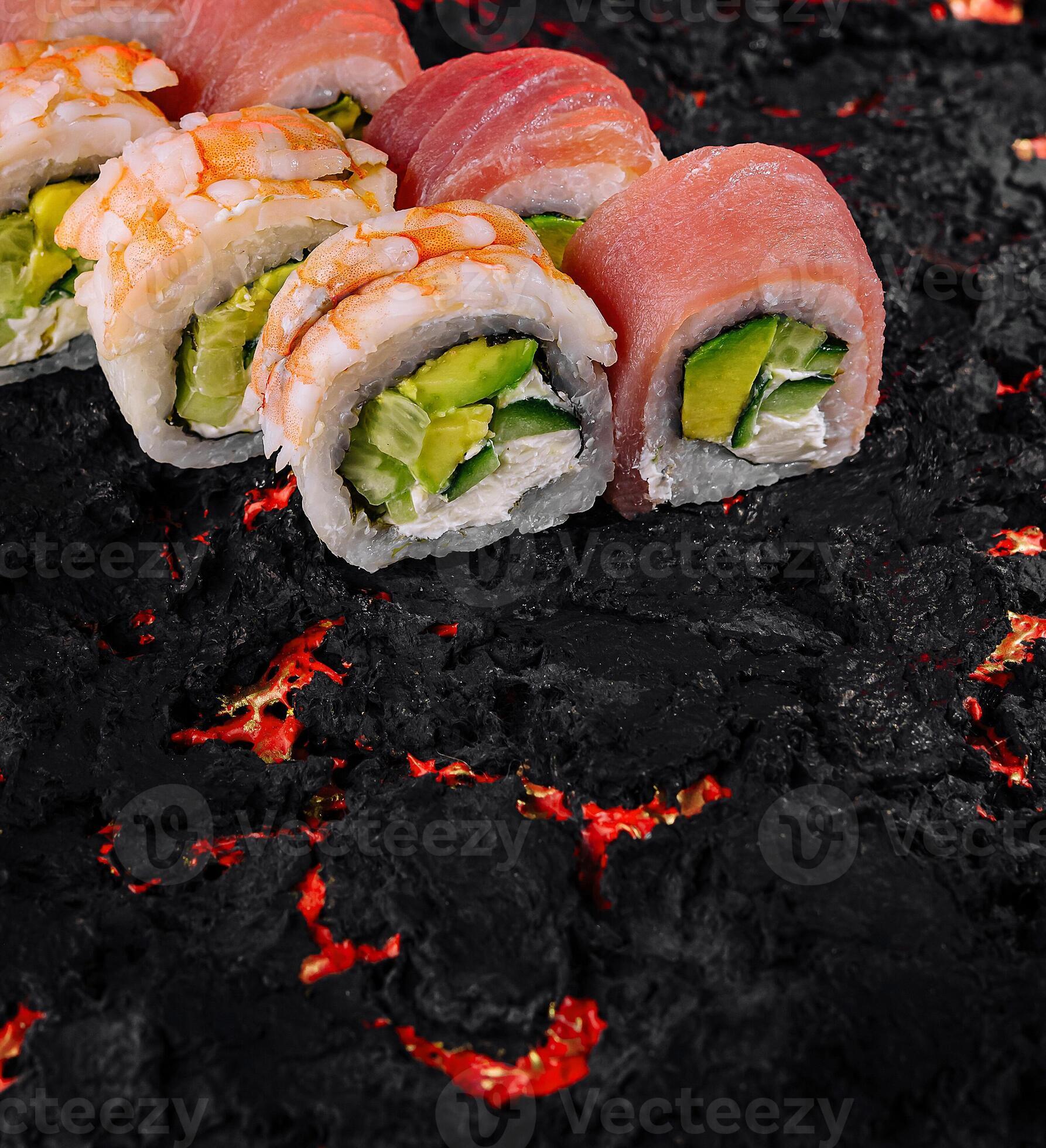 Exotic sushi rolls on fiery lava background 45608642 Stock Photo at Exotic sushi rolls on fiery lava background 45608642 Stock Photo at