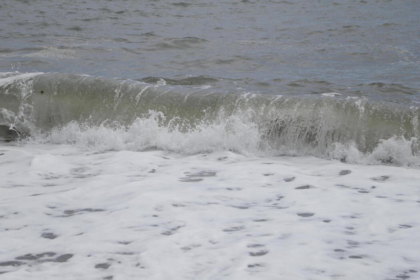 huge wave at the beach, stormy weather in spain photo