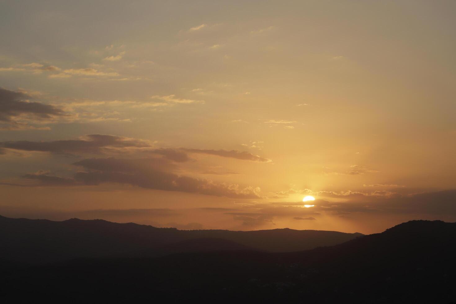 sunset behind the mountains, Spain photo
