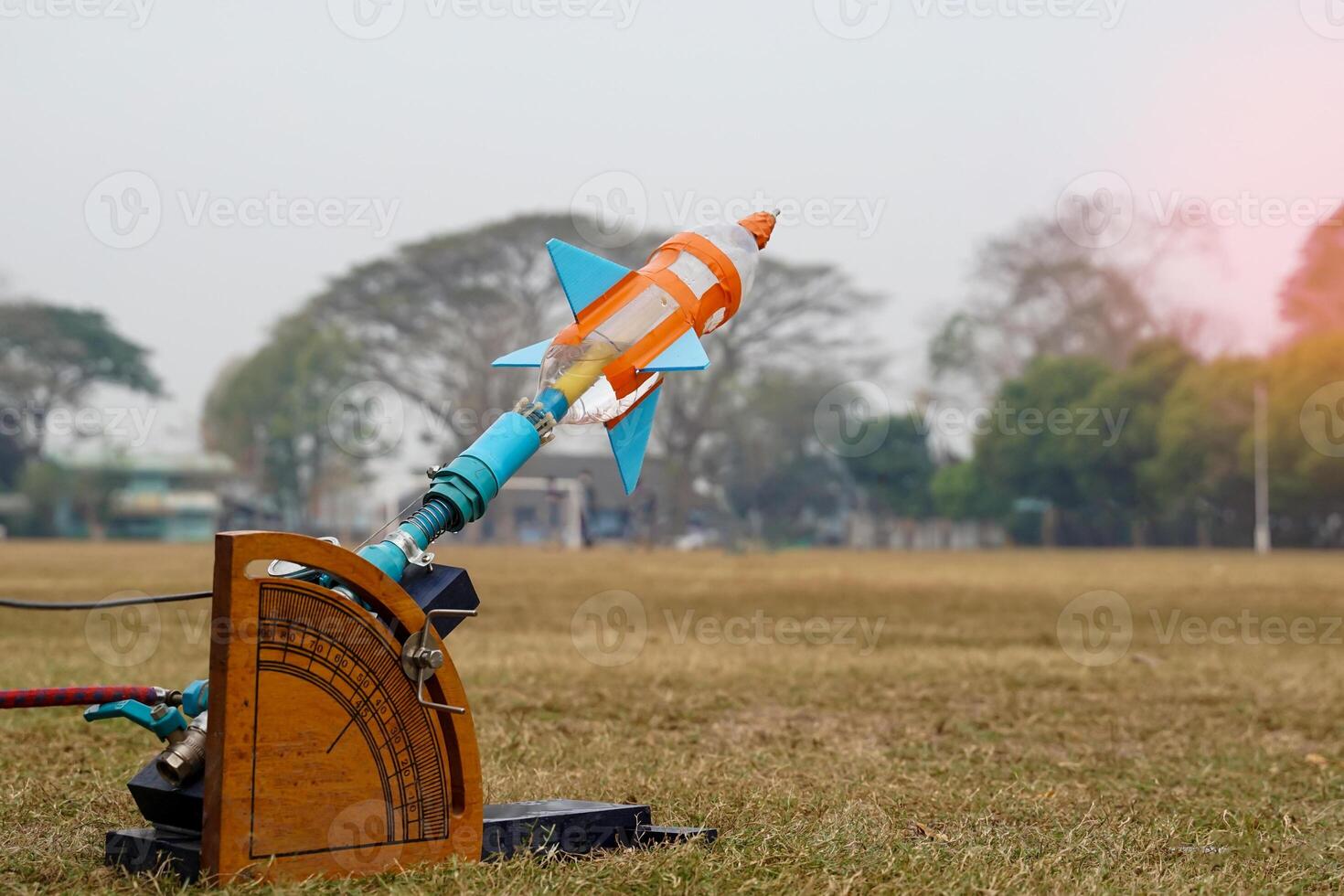 water rocket on launch pad. It is an activity that promotes science knowledge and skills for children. Children have thinking skills, problem-solving, creativity, happiness, and fun. photo