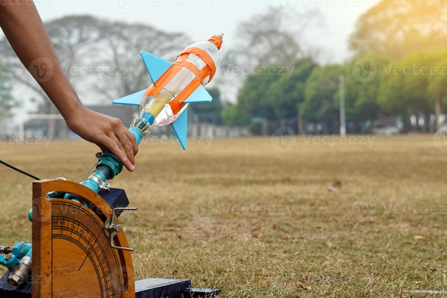 water rocket on launch pad. It is an activity that promotes science knowledge and skills for children. Children have thinking skills, problem-solving, creativity, happiness, and fun. photo