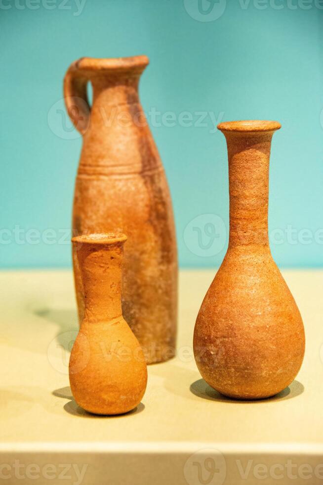 Antique ceramic decorative amphora on a white background photo