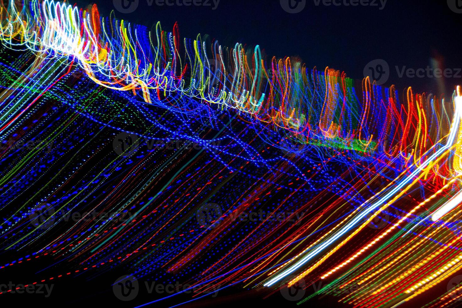 Abstract blurry background with pattern from colorful traces photo